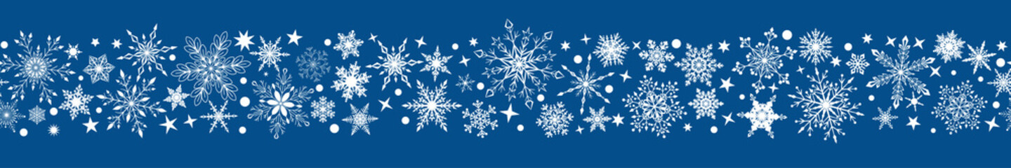 Fototapeta na wymiar Christmas banner of various complex big and small snowflakes with horizontal seamless repetition, white on blue background