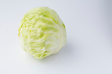 Fototapeta premium White background. A head of white cabbage. No isolation. Eco product