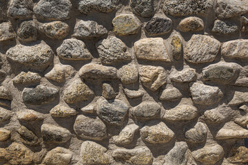 Weathered stone wall. Natural stone texture. 