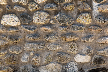 Weathered stone wall. Natural stone texture. 