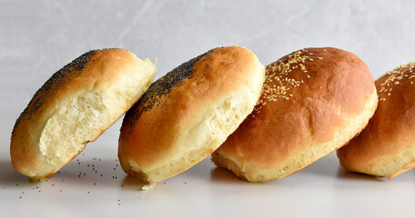 hot homemade buns with sesame and poppy seeds