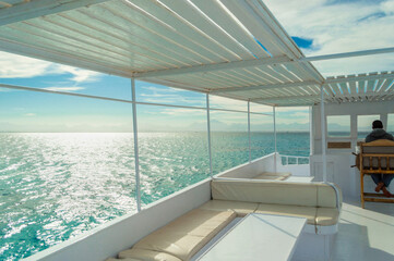 luxury vocation. yacht voyage. view from yacht to sunny horizon and sea waves.