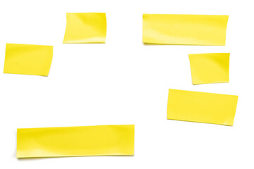 Scotch. Adhesive tape or piece of yellow sticky paper isolated on white. Torn background with strip grunge duct texture.