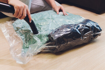 Space saver saving seal bag sucking air out , vacuum clothing storage compressed package.