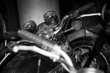 Old school Polish motorcycle in garage. Vintage black and white close up picture of famous 20th...