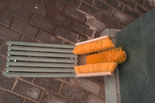 Brushes near the house for wiping street shoes