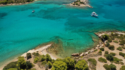 Aerial drone photo of Chinitsa bay a popular anchorage crystal clear turquoise sea bay for yachts...