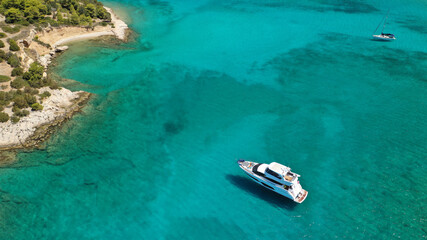 Aerial drone photo of Chinitsa bay a popular anchorage crystal clear turquoise sea bay for yachts...