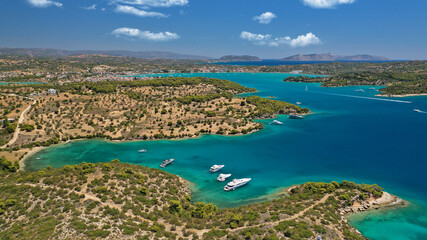Aerial drone photo of beautiful fjord landscape forming turquoise beaches in small vegetated coves...