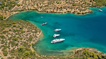 Aerial drone photo of beautiful fjord landscape forming turquoise beaches in small vegetated coves...