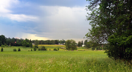 Rural Summer landscape in Sweden, Sandared (after the rain). Calm and fresh air. Spectacular clouds are on their way.