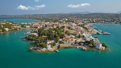 Naklejka na ściany i meble Aerial drone photo of famous fjord seaside village and bay of Porto Heli in the heart of Argolida prefecture, Peloponnese, Greece