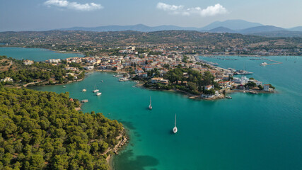 Naklejka na ściany i meble Aerial drone photo of famous fjord seaside village and bay of Porto Heli in the heart of Argolida prefecture, Peloponnese, Greece