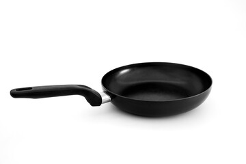 Black iron frying pan isolated on White background.