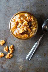 Homemade wet walnuts in a jar