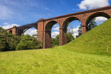 Fototapeta na wymiar Sedbergh Riverside and the Lune Viaduct. Walk 11 - A short low level walk from Sedbergh taking in the River Lune and River Rawthey the highlight being the spectacular Lune Viaduct 