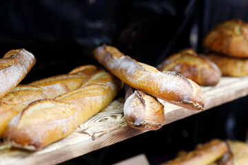 baguettes on the shelf at a bakery