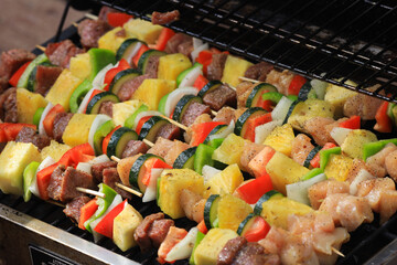 chicken and beef kebabs on the grill