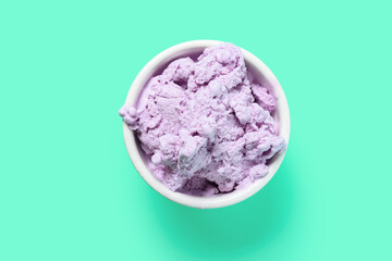 top view bowl of sweet potato flavor ice cream on a light green background