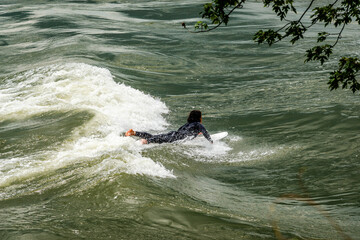 Surfing the St. Lawrence River in Montréal - Québec, Canada