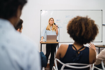 business woman explaining plan of work in conference.