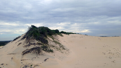 Fototapeta na wymiar sand dunes and clouds