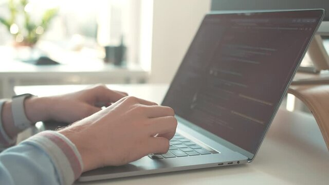 Coding. businessman type on laptop keyboard. Touch typing pointing cloud data social network media or virus. Working on tablet computer, Extreme close-up human hands. Using internet in web office.