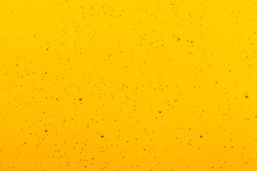 Raindrops on a yellow background.
