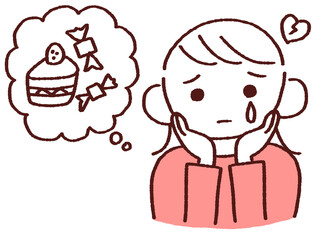 甘いものを我慢する若い女性