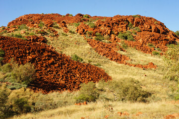 Rolling Hills of Red Rocks in Desert