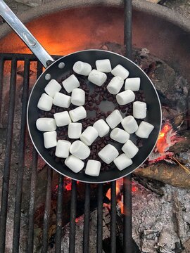 s’mores dip on the grill over a campfire
