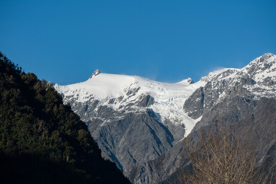 Mountain ranges and peaks as seen from the Franz Josef region of New Zealand	
