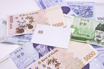 A credit card on money (Korean currency)