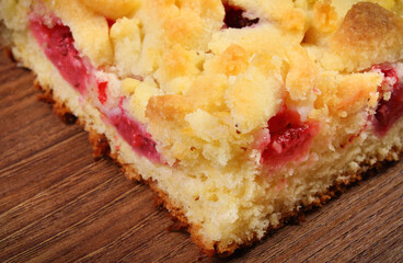 Fresh baked yeast cake with crumble and strawberries. Delicious dessert