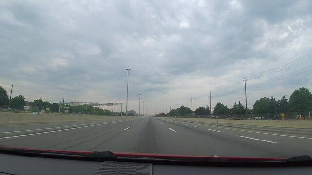 Hyperlapse out of a car windshield driving on Canadian highway.
