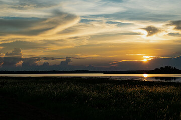 Obraz premium sunset at Namphan small lake Sang khom Udonthani.