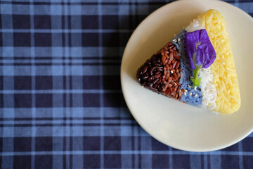 colorful rice with sesame. brown, red riceberry, yellow safflower, blue butterfly pea, white rice
