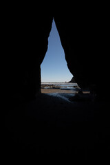 Looking out from a cave on a West Coast Beach on the South Island of New Zealand
