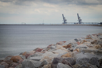 Rocky beach at Westerplatte, Gdansk. with visible fuel depot.