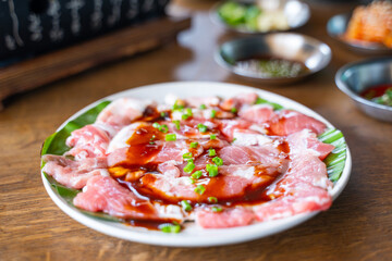 close up sliced pork for grilled in barbecue restaurant