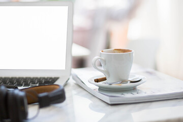 cup of coffee on the table in cafe.