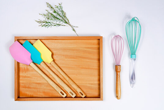 Baking pastel colour equipment on white background. Flat lay bakery text space images.