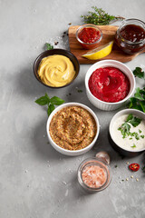 Set of various sauces in bowls
