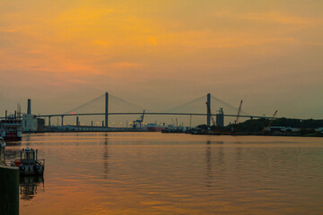 Fototapeta na wymiar Sunset on The Talmadge Bridge and The Port of Savannah ,Savannah,Georgia,USA