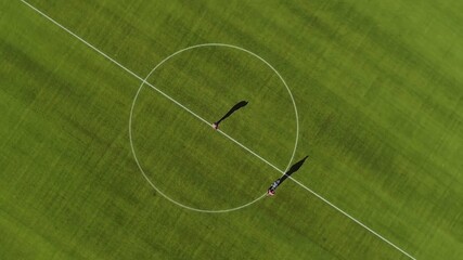Aerial view of Marking football stadium field with paint