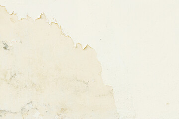 Peeling paint on old grunge white dirty concrete wall texture abstract background