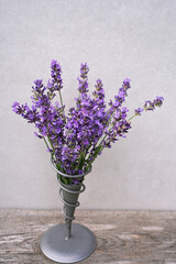 bouquet of lilac in a  spiral vase