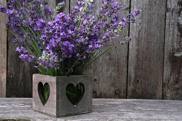 lavender flowers in a heart box 