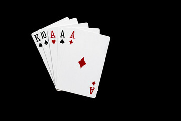 Three of a kind combination in poker on black background. Poker  combinations concept.
