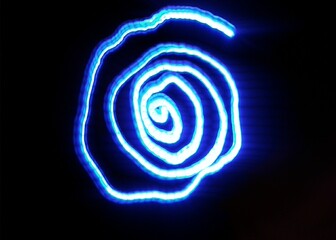 Light painting design. Combination of sky blue and white light against a black background 